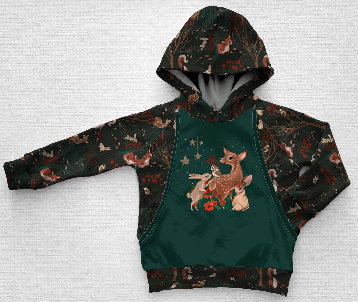 A dark green panel hoodie with forest animals at night